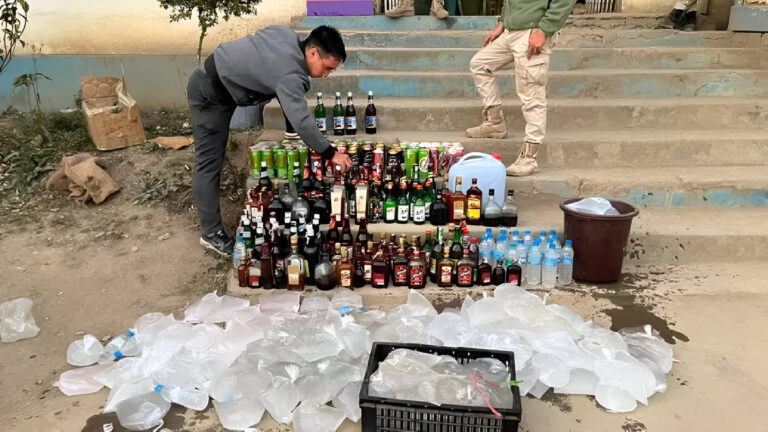 Manipur Police Seizes and Disposes Large Quantity of Illicit Liquor Bottles in Churachandpur